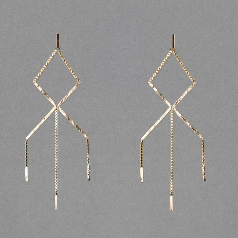 gold-fill shoal creek earring by austin texas based jeweler haley lebeuf. this modern bohemian earring has box chain and a lot of  texture