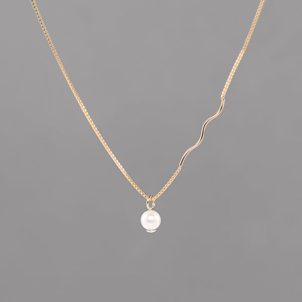 Rebirth Pearl Charm Necklace from the Springs Collection by Haley