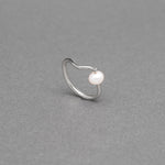 modern pearl ring with movement, pearl is offset, available in sterling silver and 14k gold-fill